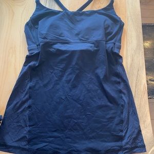 Lululemon tank size 2 with out tag. Built in bra, loose fit